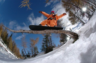 extreme sports snowboarder jumping