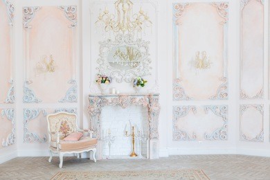 luxurious expensive interior design of the living room in the old baroque style in beige colors