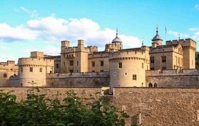 the tower of london, officially her majesty's royal palace and fortress of the tower of london, is a historic castle located on the north bank of the river thames in central london.