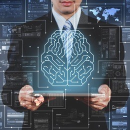 businessman using tablet showing ai, artificial intelligent conceptual