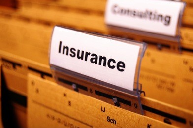 insurance word on business folder showing risk management concept