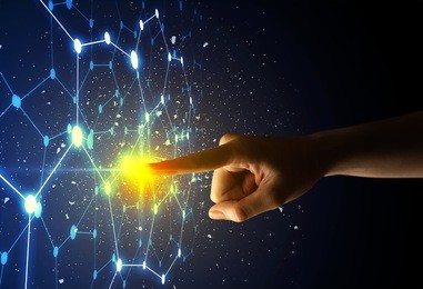 female finger touching a beam of light surrounded by a connectivty concept