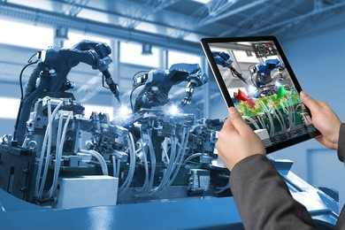 industrial 4.0 , augmented reality concept. hand holding tablet with ar service , maintenance application and calling technician for check destroy part of smart machine in smart factory background