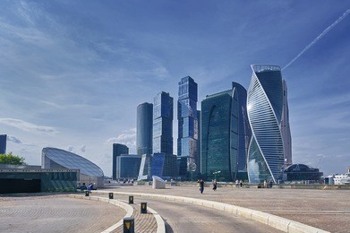view on moscow city business center skyscrapers office buildings, luxury apartments. people on sightseeing viewing point. moscow city skyscrapers panorama. modern european russian architecture