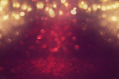red glitter vintage lights background. defocused.