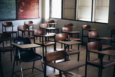 soft and blur focus.row lecture chairs in classroom in poor school