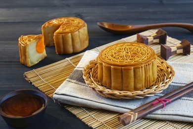 moon cake for mid autumn festival , retro vintage style of chinese traditional food and dessert. ( moon cake is call " yue bing " in chinese language)