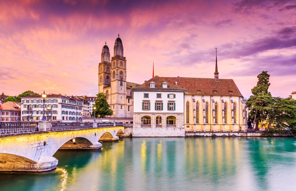 zurich, switzerland. view of the historic city center with famous grossmunster church, on the limmat river.