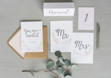 wedding card invitation on gray background
