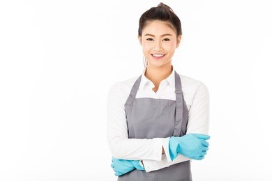 attractive beautiful asian woman maid smile and cross arm,isolated on white background,cleaning service concept