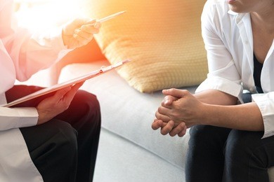 doctor and patient healthcare concept. gynecologist physician consulting and examining woman patient health in obstetrics and gynecology department in medical hospital health service center.