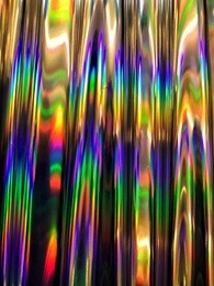 holographic background with multiple colors.