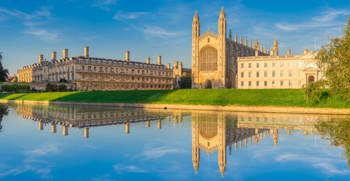 waterfront panorama of college in cambridge with reflection, uk