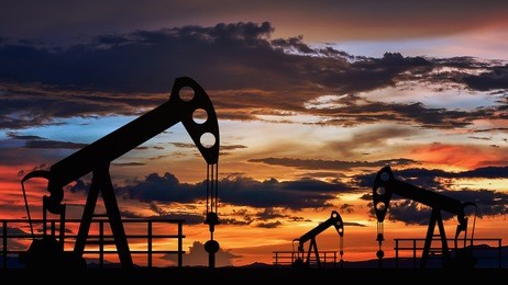 oil pump oil rig energy industrial machine for petroleum in the sunset background for design