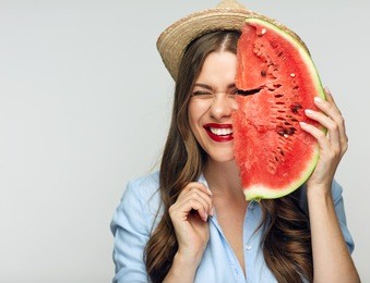 beautiful smiling woman portrait with watermelon. summer vitamin food concept.