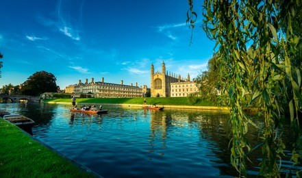 clare & king's college with beautiful blue sky in cambridge, uk