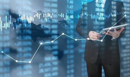investment concept,hand with stock financial chart symbols coming from hand
