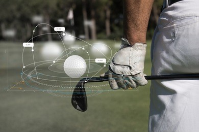 golf equipment, golf ball with tee on course and stick