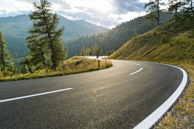 asphalt road in austria, alps in a beautiful summer day, hochalpenstrasse.