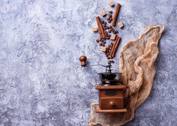 creative coffee background with beans, sugar and cinnamon. flatlay style. top view