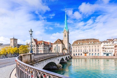 zurich, switzerland. view of the historic city center with famous fraumunster church, on the limmat river.