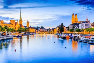 zurich, switzerland. view of the historic city center. grossmunster church and fraumunster church on the limmat river.