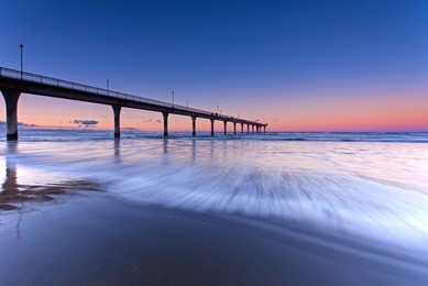 long exposure wave new brighton beach view in christchurch, south island, new zealand.