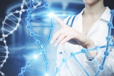 female doctor pointing at abstract dna hologram on blurry background. science concept 
