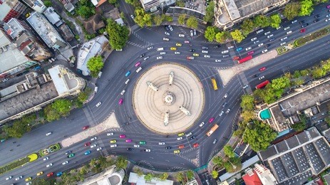 aerial view, road roundabout, expressway with car lots in the city in thailand.  beautiful street , downtown, cityscape, top view. background road.