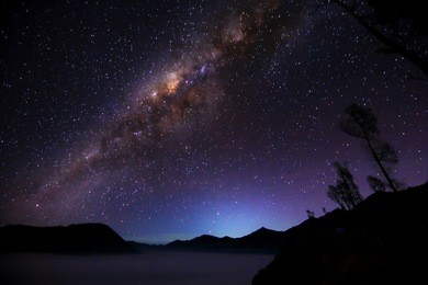 the outstanding beauty and clarity of the milky way and the starry sky captured from high altitude on the mount bromo, indonesia.