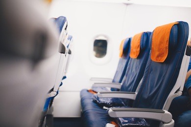 interior of airplane seats in cabin economy class