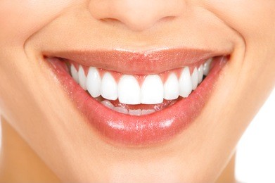 healthy woman teeth and smile. close up.