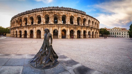 evening view of nîmes arena - france
