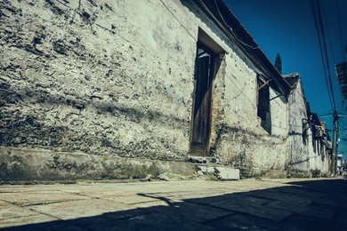 road and houses in xidi - road and houses in xidi, anhui, china, is shown in circa dec. 2011, which is famous for its kept old style village inclusive road, houses.