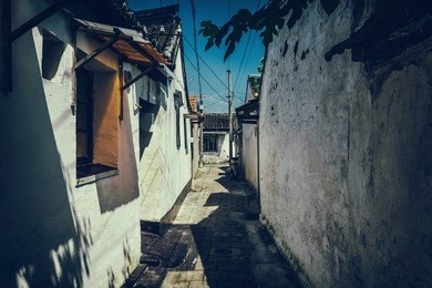 road and houses in xidi - road and houses in xidi, anhui, china, is shown in circa dec. 2011, which is famous for its kept old style village inclusive road, houses.