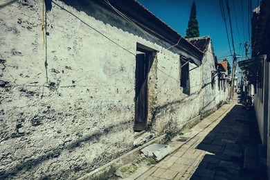 road and houses in xidi - road and houses in xidi, anhui, china, is shown in circa dec. 2011, which is famous for its kept old style village inclusive road, houses.