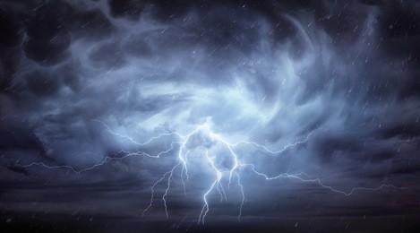 rain and thunderstorm in dramatic sky
