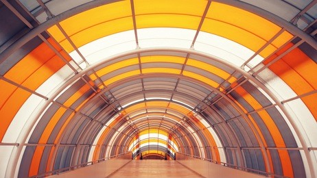a bridge tunnel with yellow roof