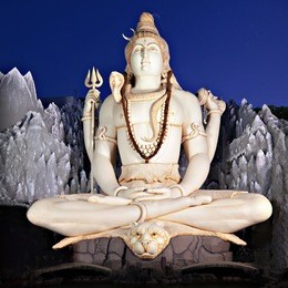 lord shiva big statue sitting in lotus pose with trident in murugeshpalya temple in bangalore, india. this shiva statue is highest in the world.