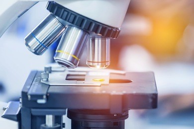 close up microscope equipment for research experiments in science laboratory