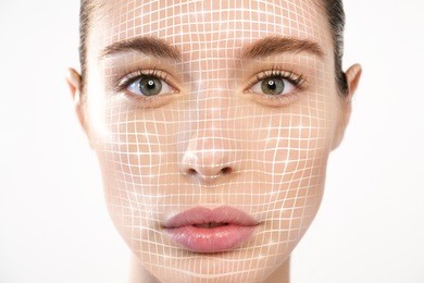 futuristic and technological face scanning of a beautiful woman for facial recognition and facial lifting for rejuvenation. it can serve to ensure personal safety. concept of: future,security,scanning
