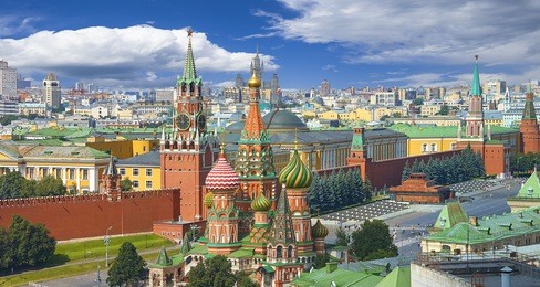 view on moscow red square, kremlin towers, clock kuranti, saint basil's cathedral church, lenin mausoleum. panorama hotel russia. moscow holidays vacation tours famous sightseeing. moscow red square