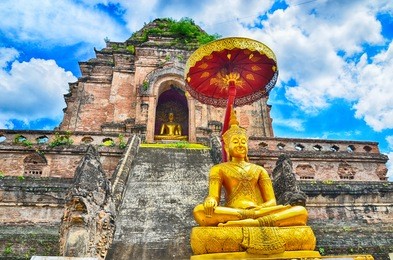 wat chedi luang and buddha statue in chiangmai thailand