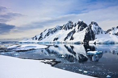 beautiful snow-capped mountains against the blue sky in antarctica