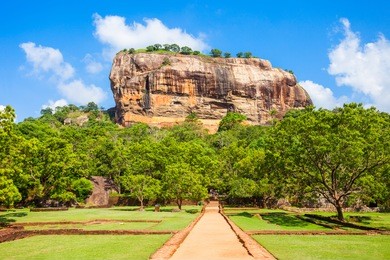 sigiriya rock or lion rock is an ancient fortress near dambulla, sri lanka. sigiriya is a unesco world heritage site.