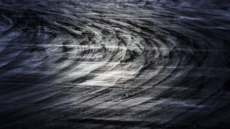 race track with tire rubber marks.