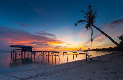 sunset at mantanani island,sabah,borneo.the island has long stretch of white sandy beaches and crystal clear water. sitting on the beach with the sea breeze blowing on your face is just pure heaven.

