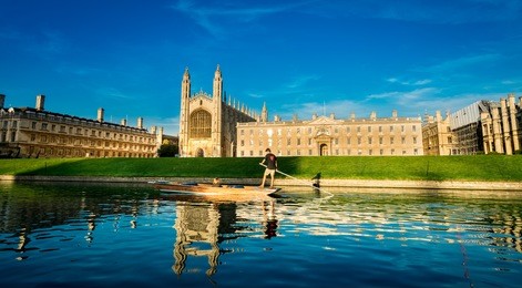 clare & king's college with beautiful blue sky in cambridge, uk