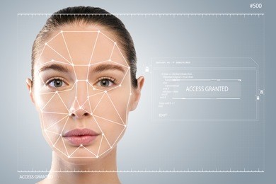 futuristic and technological scanning of the face of a beautiful woman for facial recognition and scanned person. it can serve to ensure personal safety. concept of:  future, security, scanning.