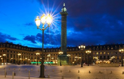 the vendome column , the place vendome at night, paris, france.